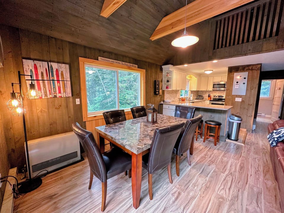 Upper level dining area and kitchen