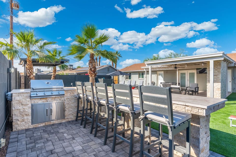 New custom BBQ with peninsula and bar to hangout while you grill!
