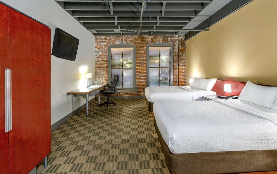 Settle in comfortably with two beds and an industrial-chic vibe