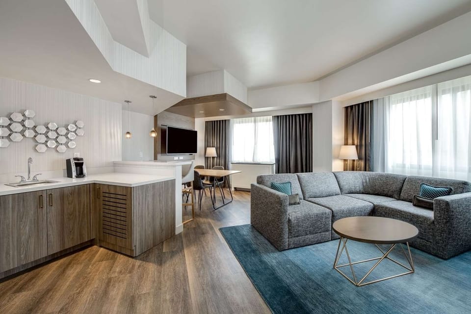 Gather for coffee and conversation in the airy kitchenette lounge