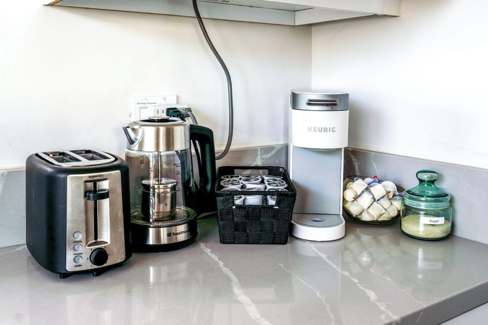Start your culinary journey in our kitchen complete with a Keurig coffee maker.