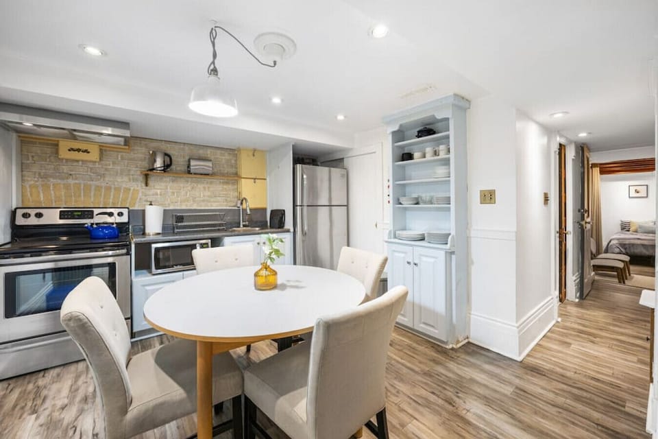 Lower level fully-equipped kitchen with stove, oven, refrigerator and microwave.