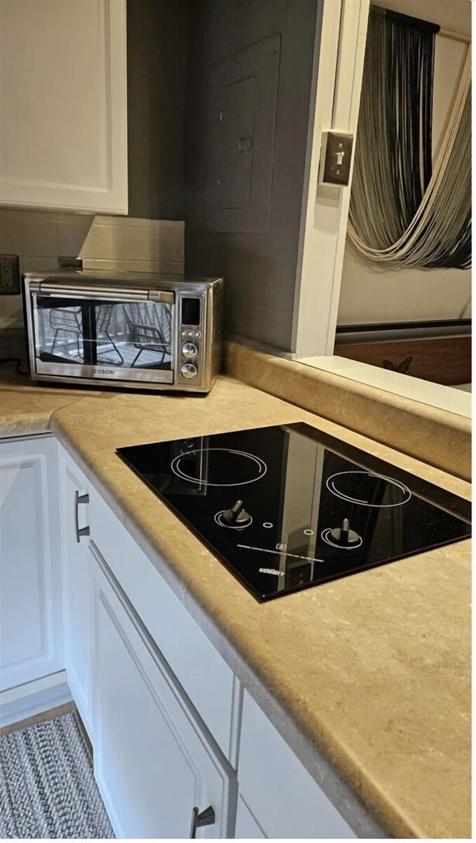 Toaster oven and stove, great for cooking small meals.
