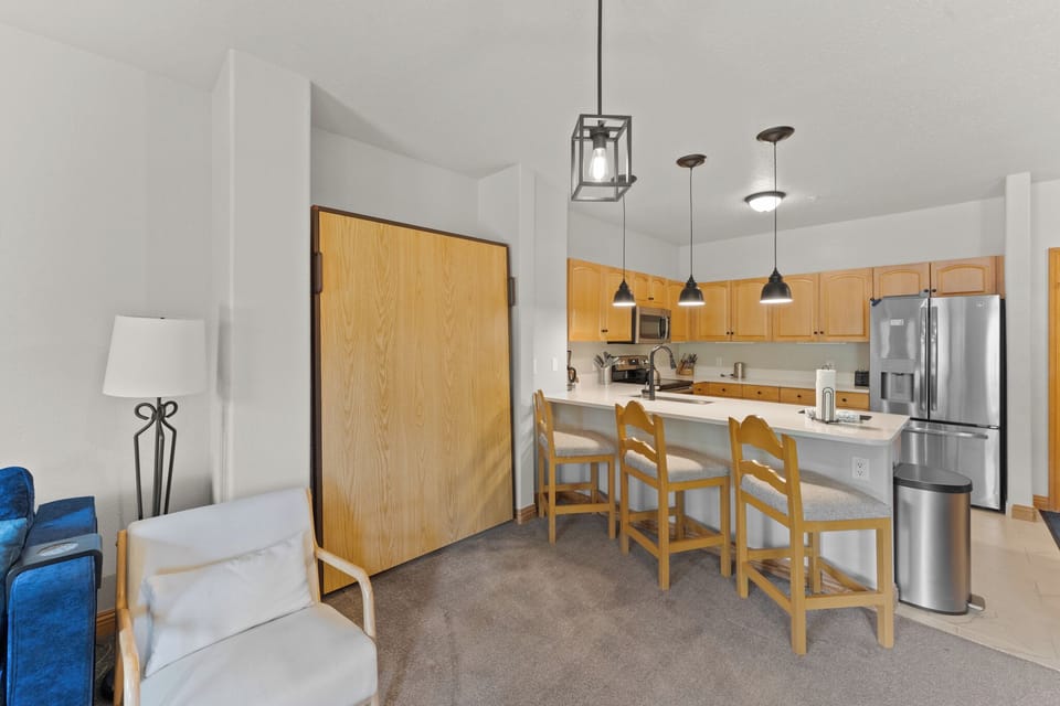 Full-size Murphy bed for extra sleeping options.