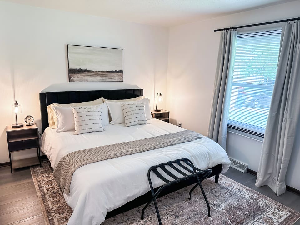 The Quiet Surroundings Promote Restful Sleep in the Primary King Bedroom