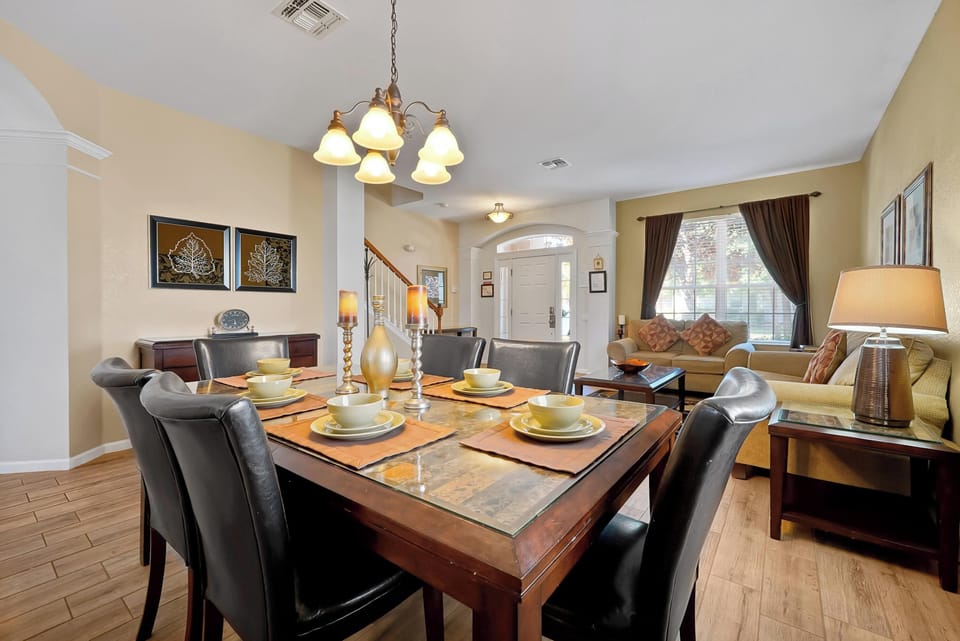 Elegant dining area with seating for six, perfect for family meals and gatherings.