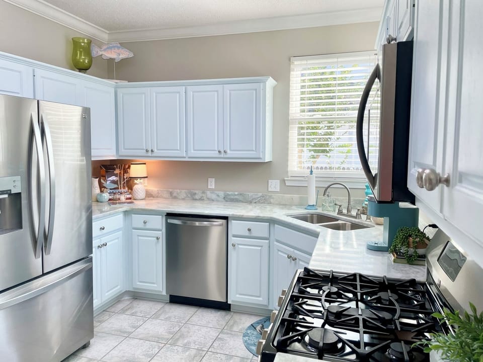 The kitchen has everything you need; gas stove, dishwasher, ice maker, cookbooks