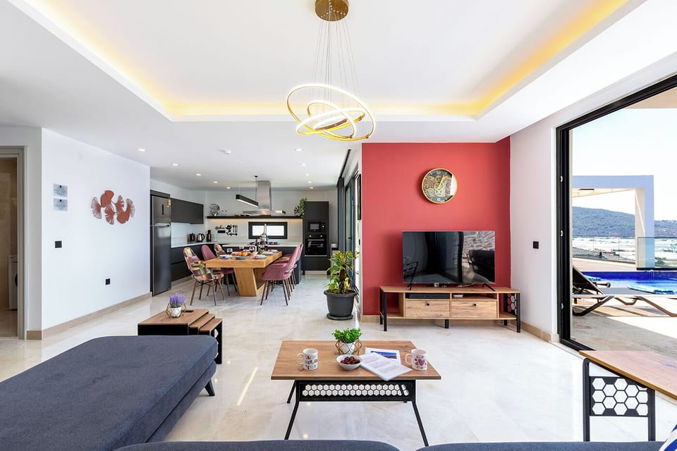 Modern lounge and dining areas with marble flooring throughout