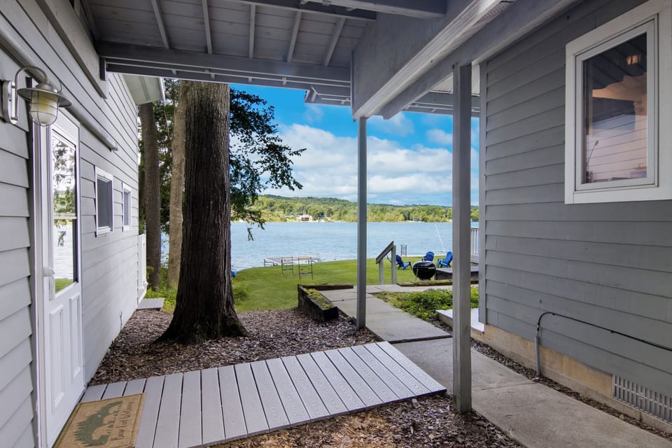 Entrance to separate cabin, with covered walkway to main house.