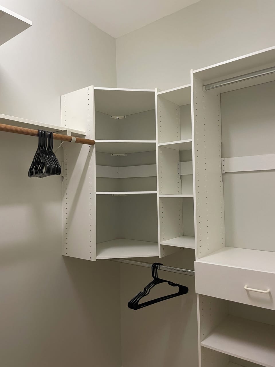 Primary suite walk in closet offers loads of storage 
