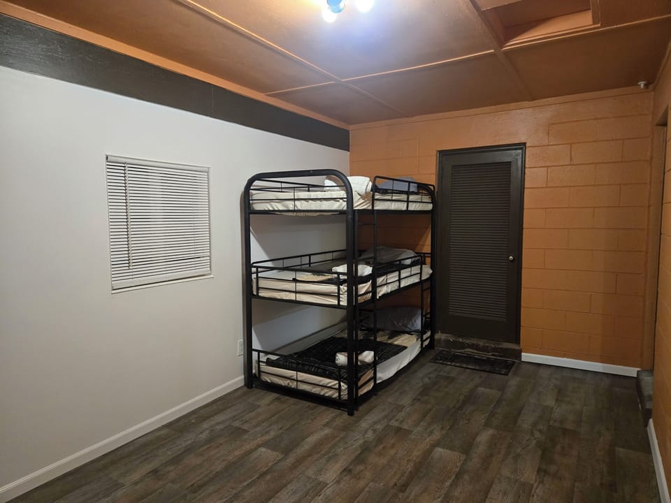 4th bedroom with a bunk bed and queen bed