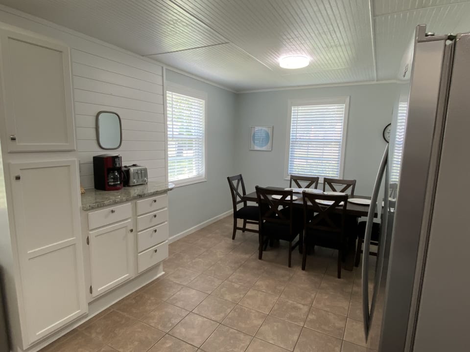 Large dining area adjacent to kitchen