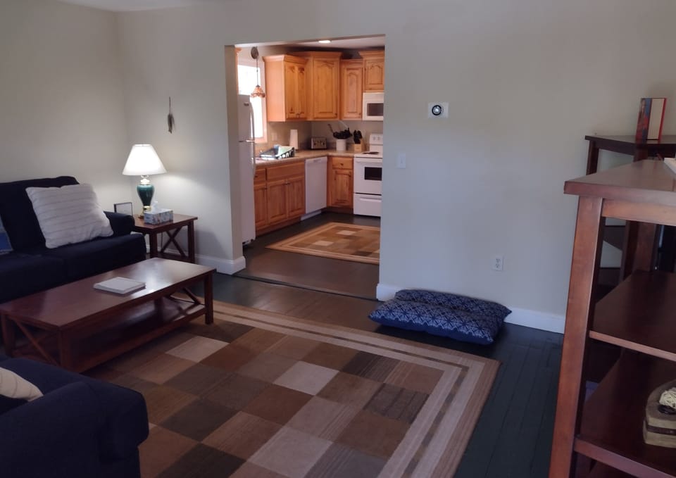 Living room opens to kitchen