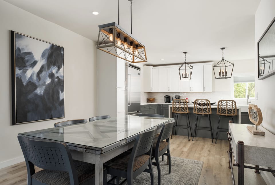 Custom hand-made dining table built from an antique door salvaged from remodel