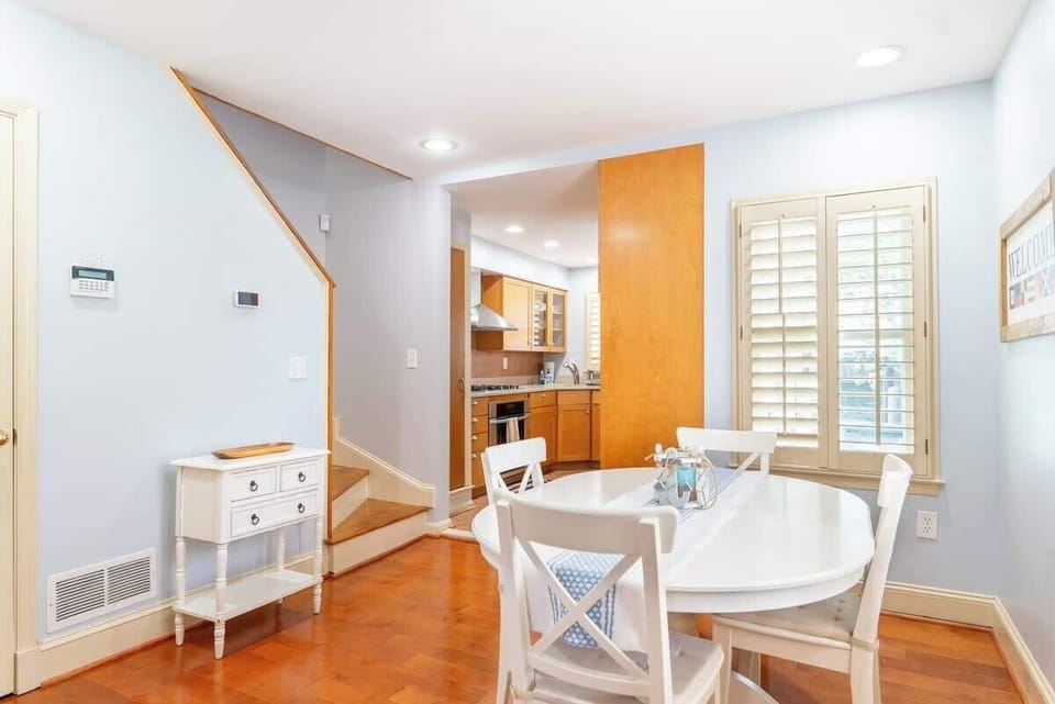 This cozy dining room is a space that invites warmth and togetherness. It is designed to provide a delightful setting for shared meals and cherished moments with friends and family. 