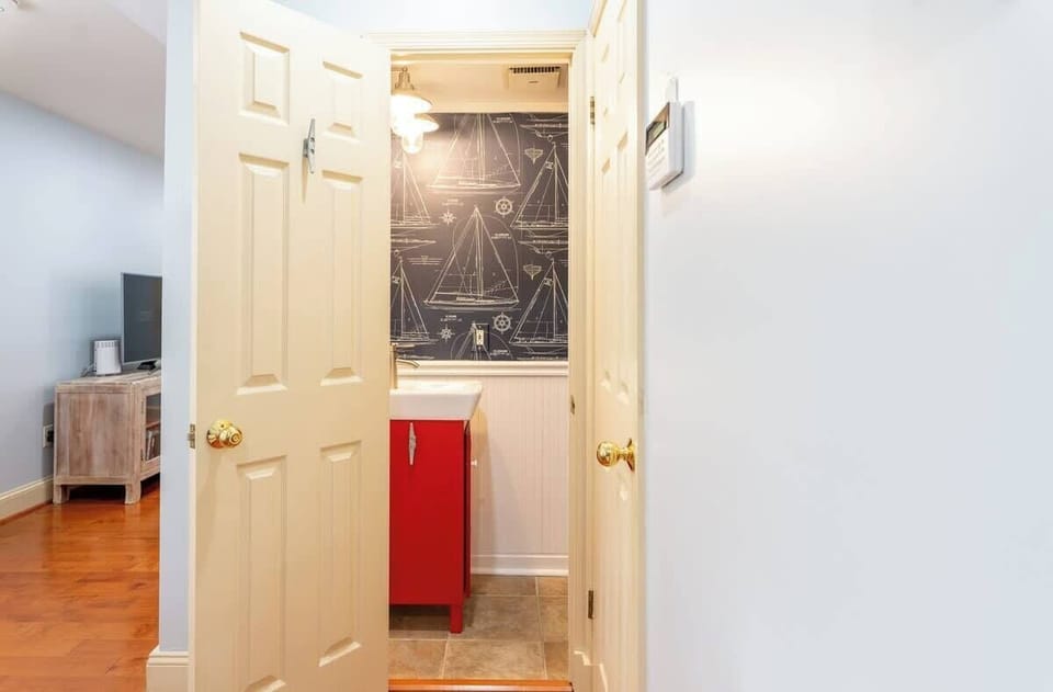 Main level half bathroom. 