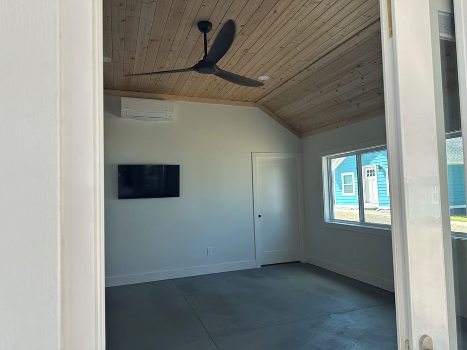 Shared interior recreational space adjacent to the cabanas