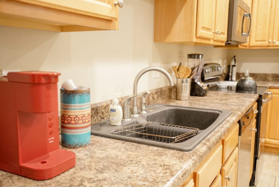 Well-equipped kitchen with coffee station and ample counter space