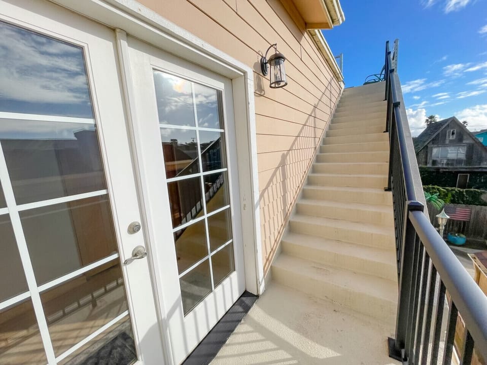 Outdoor stairs to rooftop deck