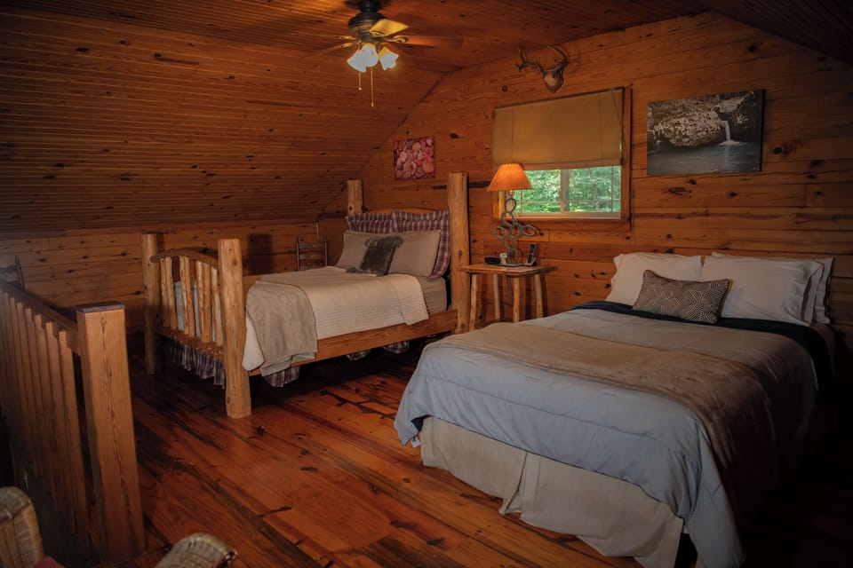 Two queen beds in the loft.