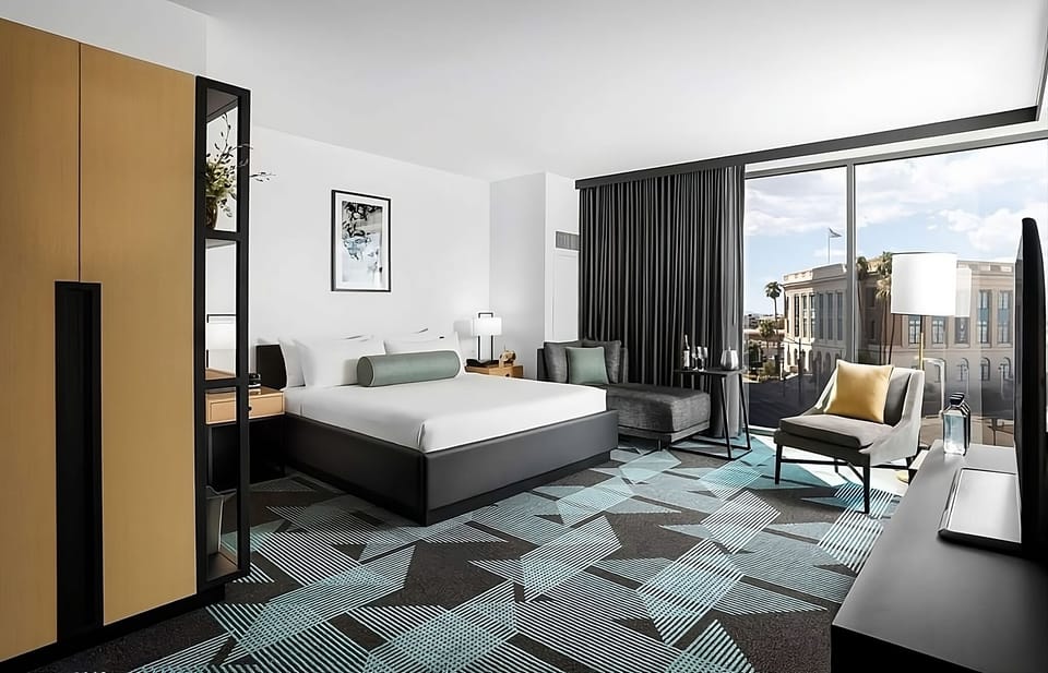 Wake up to sunshine and city views in comfort.