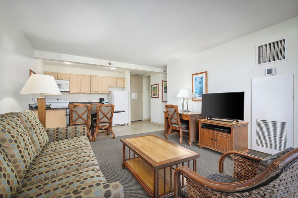 Your inviting open-concept retreat features a fully equipped kitchen, cozy dining area, and relaxing living space with flat-screen TV—all the comforts you need to settle in and unwind after your adventures.