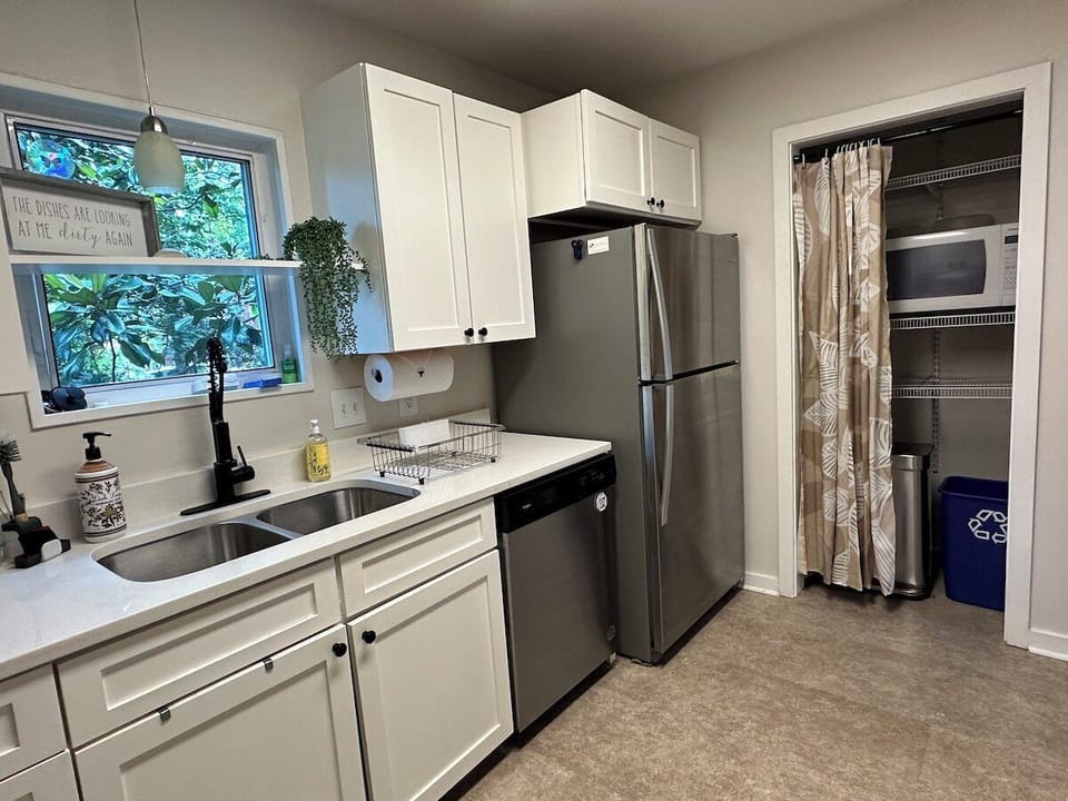 Fully stocked upgraded kitchen with full size dishwasher, stove and fridge. 