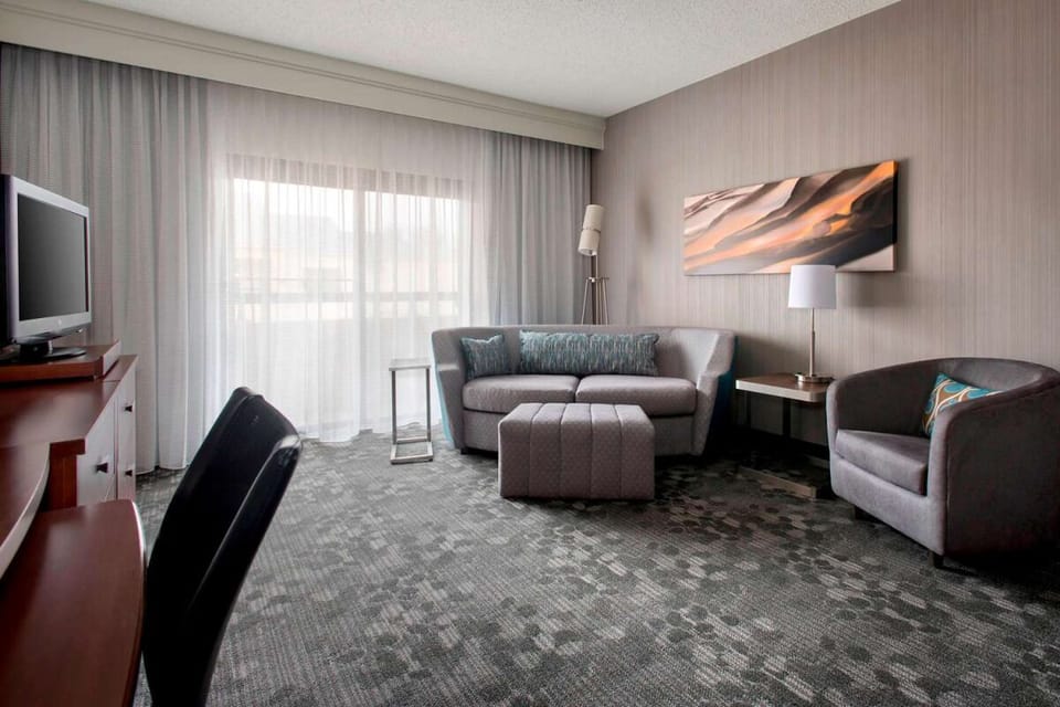 Stretch out on the sofa in a bright, airy lounge.