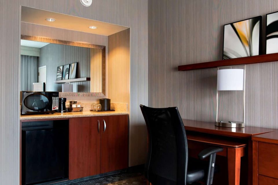 Fix quick snacks with an in-room microwave and mini fridge.