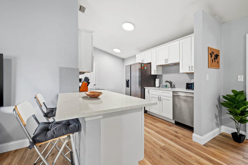 Updated Kitchen with Additional Seating at the Peninsula