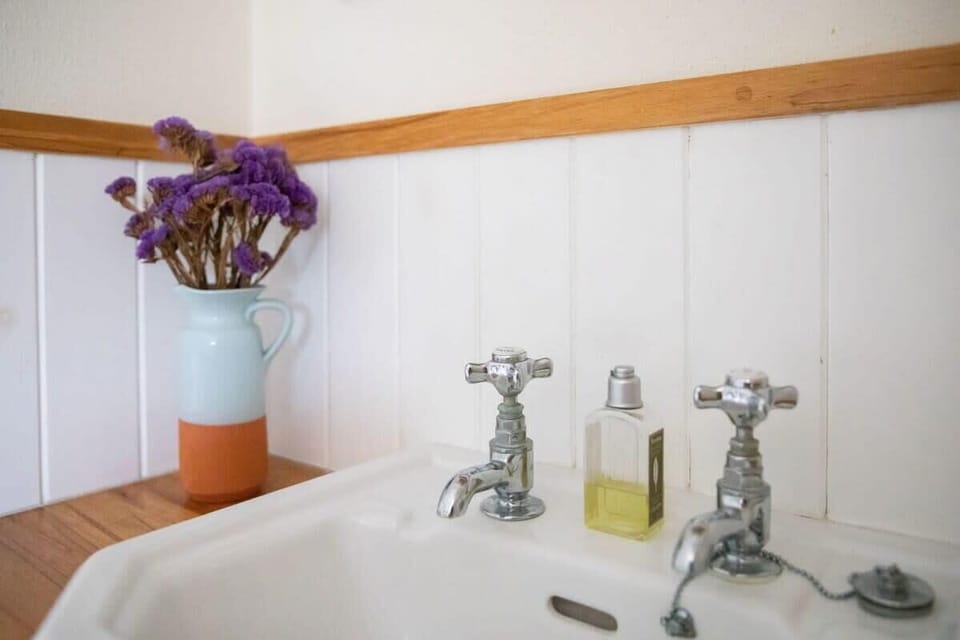 The downstairs king room has a sink for your convenience and comfort.