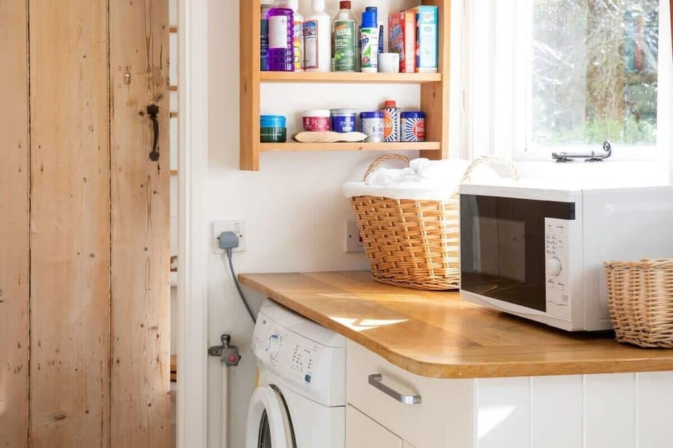 Keep on top of holiday washing in or organise bags in the utility.