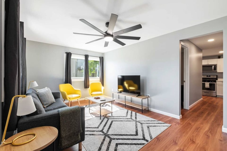 Modern Living Room with  55` Flat screen smart TV