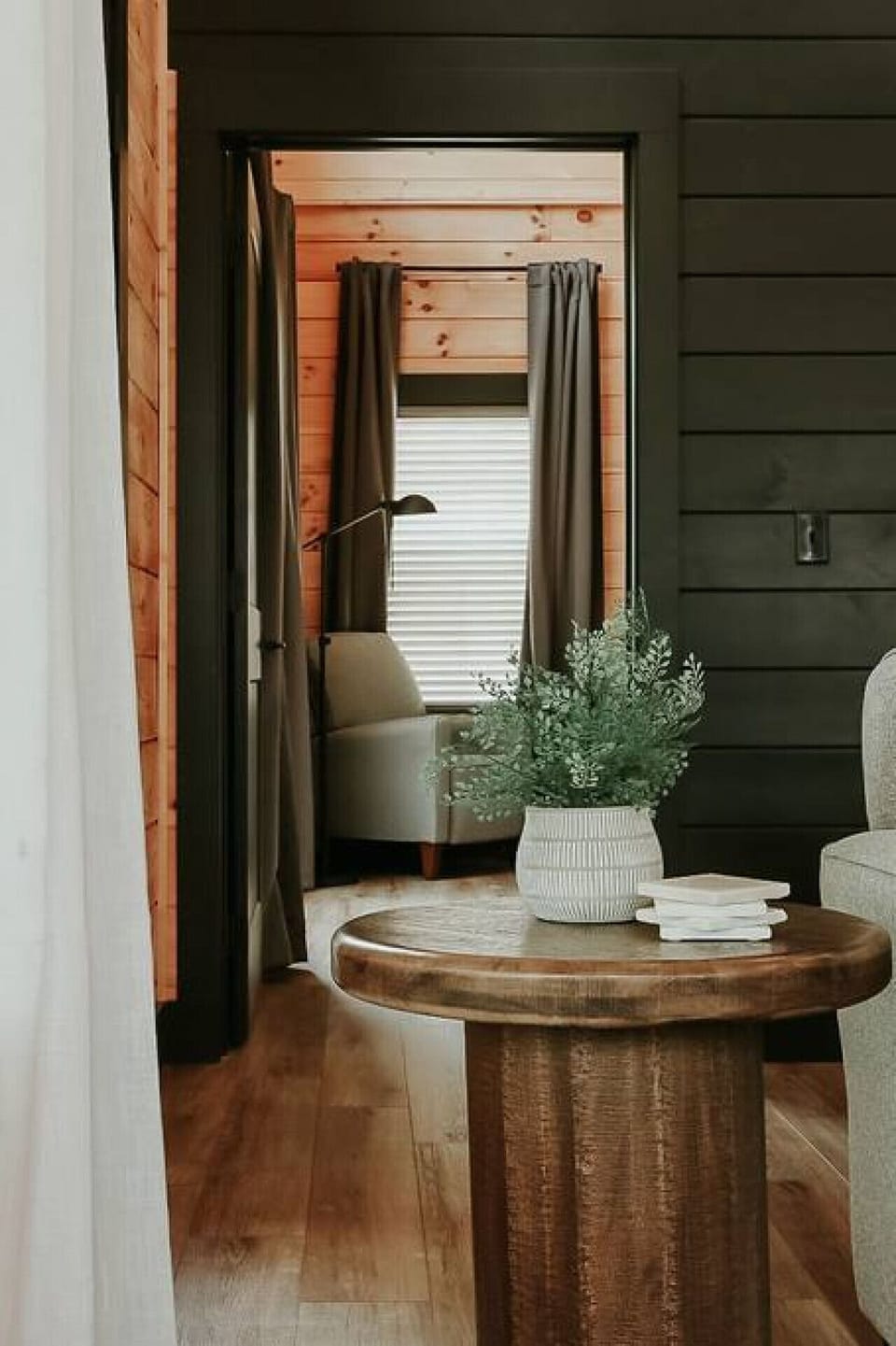 Living room adjacent to large bedroom.