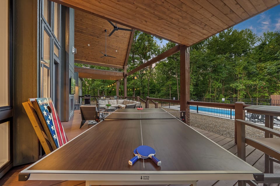 Outdoor Lounge: Enjoy friendly ping pong matches with nature as your backdrop and a pool nearby!