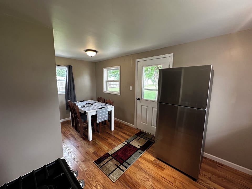 Dining area with access to outdoor patio, grill and outdoor dining area. 