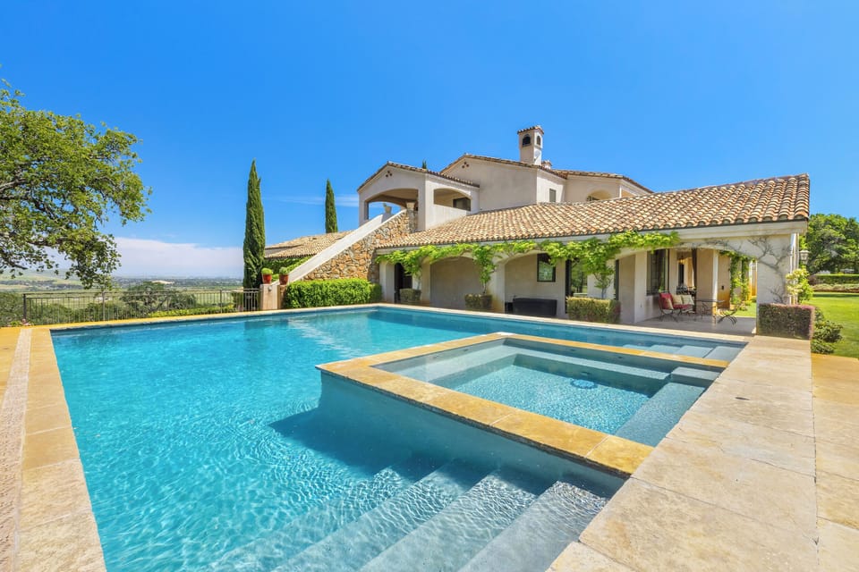 The estate grounds are meticulously manicured and cared for with gorgeous outdoor areas.