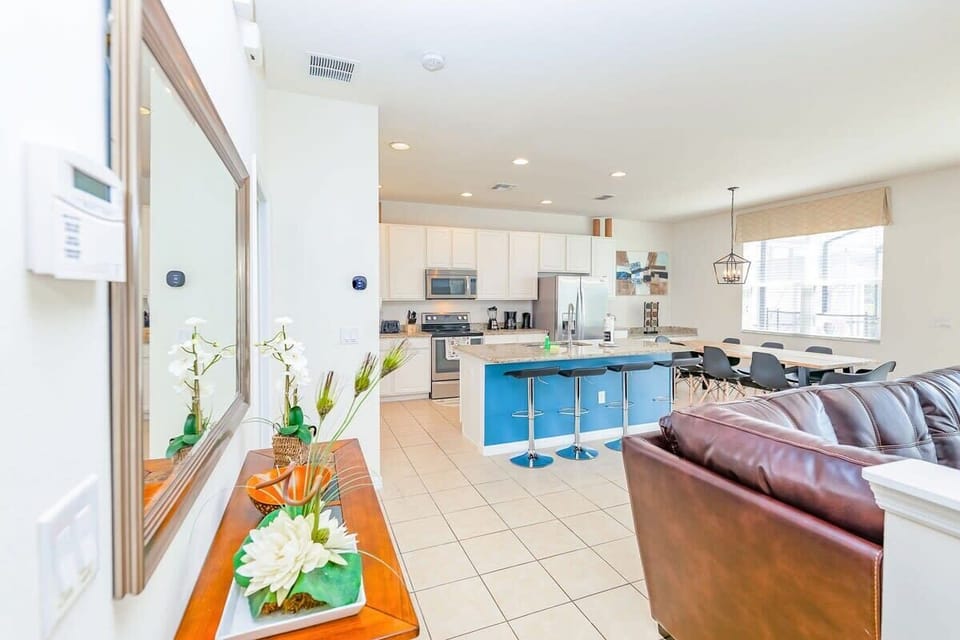 An open-concept layout connecting the living room and kitchen.
