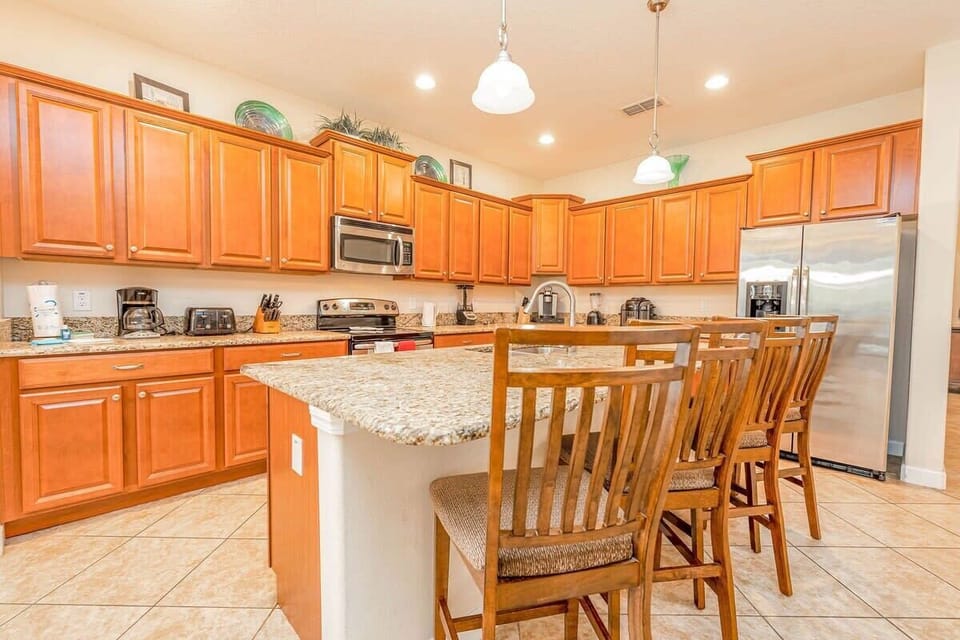 A comfortable breakfast bar with seating for four.