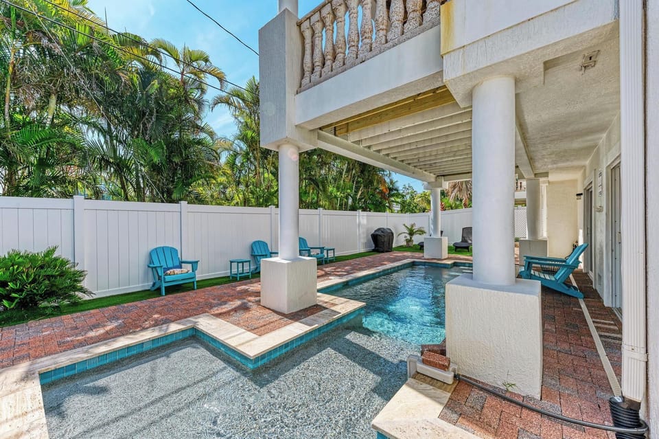 Large heated pool runs under the balcony