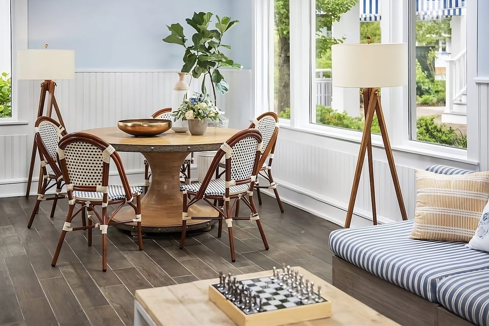 Sip morning coffee by bright windows and coastal breezes.
