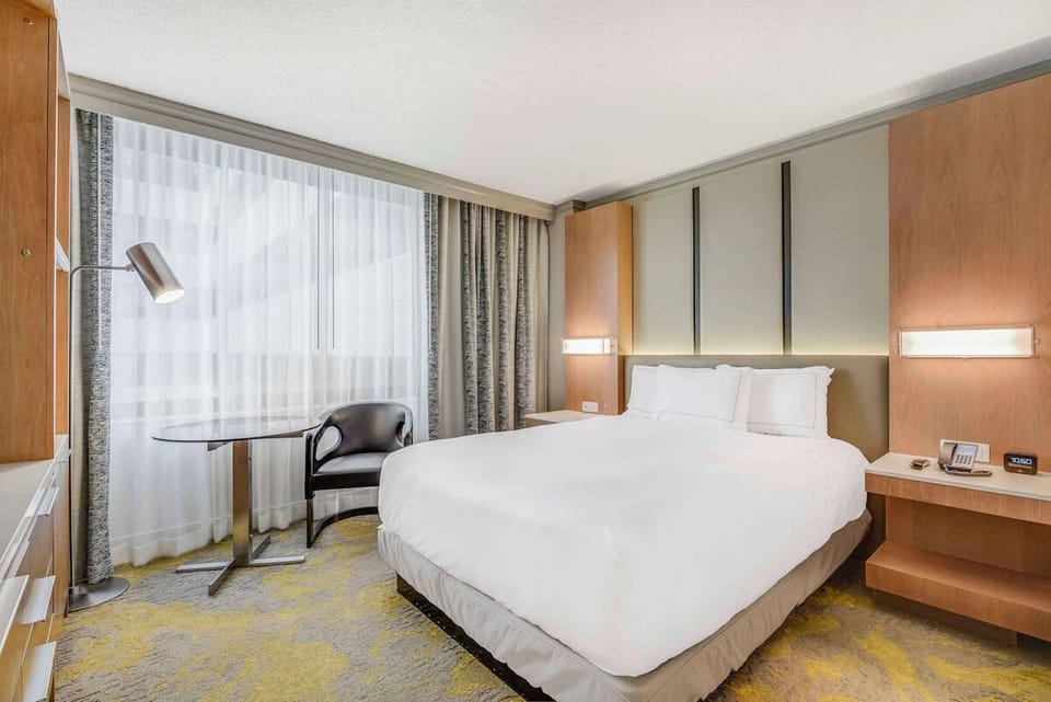 Drift into deep sleep on cloud-soft bedding and pillows.