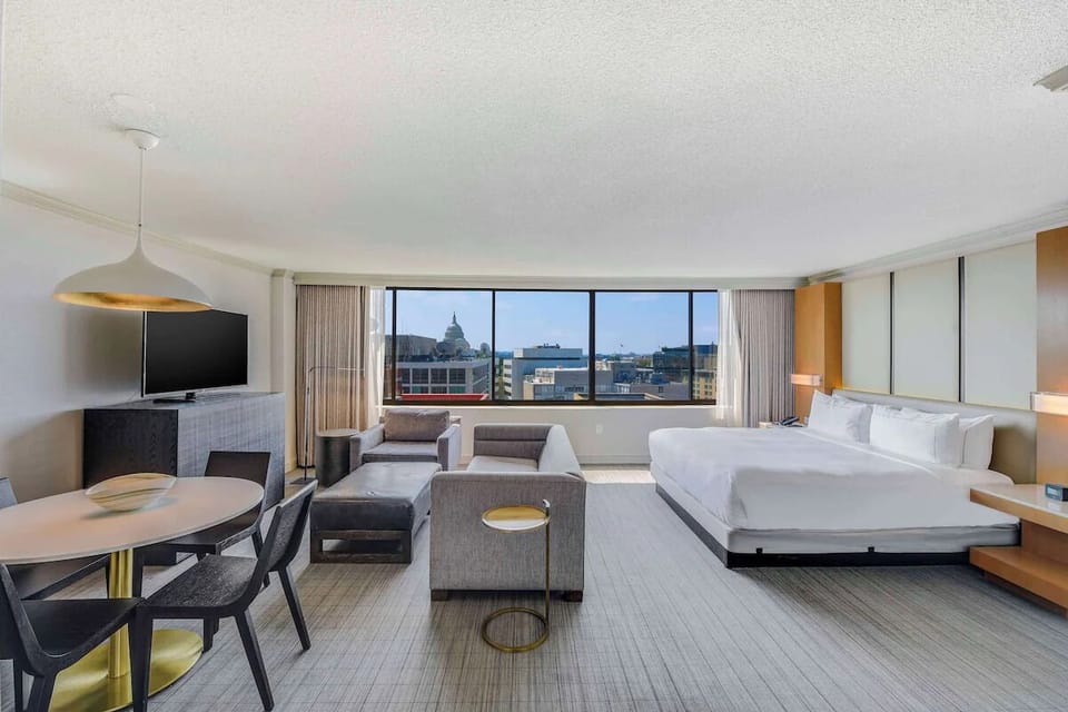 Spread out in a spacious suite with lounge seating and views.