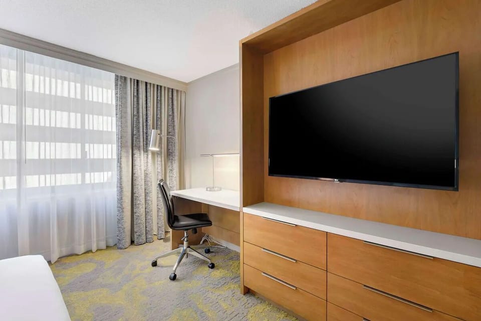 Settle in with a spacious desk for focused, comfortable work.