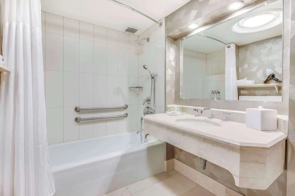 Refresh in a bright, spotless bath with deep soaking tub.