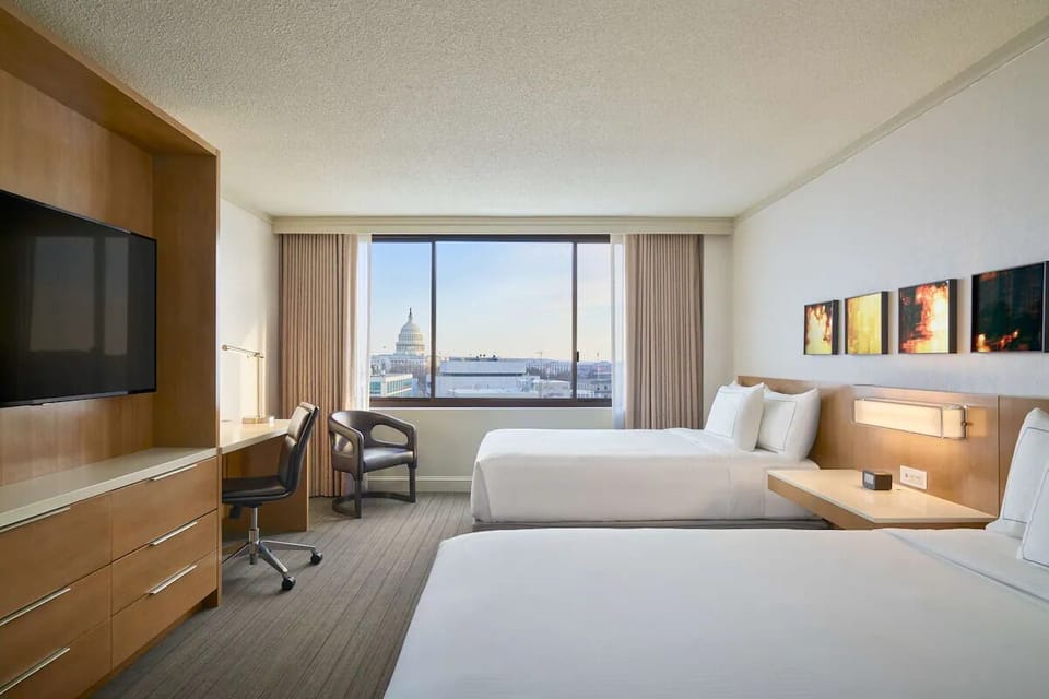 Wake up to bright city vistas from your comfortable double room.