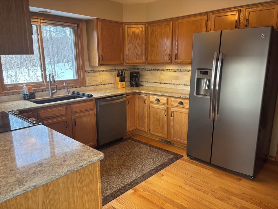 Main Kitchen - View 2
Includes refrigerator, stove, microwave, dishwasher.