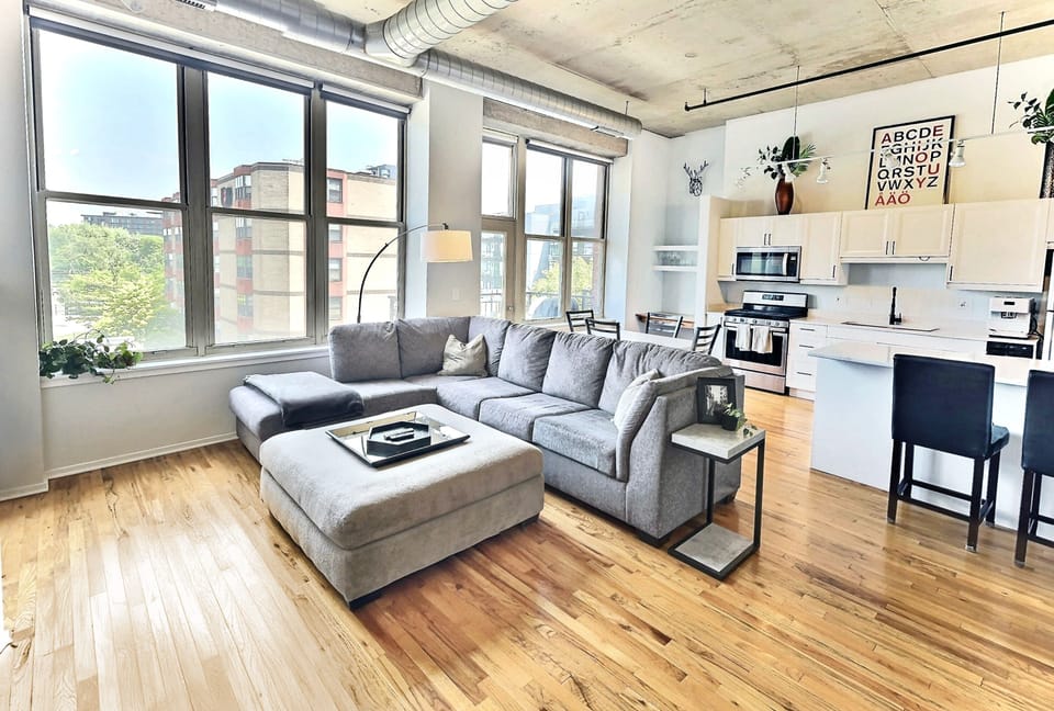 Loft with open floor plan and very high ceilings and tons of natural light.