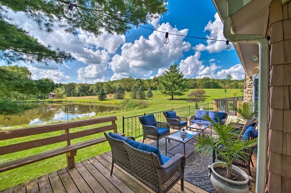 Lounge waterfront on wraparound deck with mountain views and farm landscape