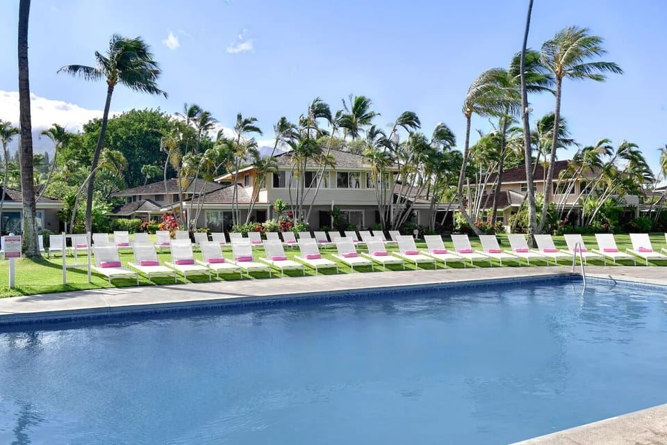 Stretch out on sun loungers and soak up island serenity.